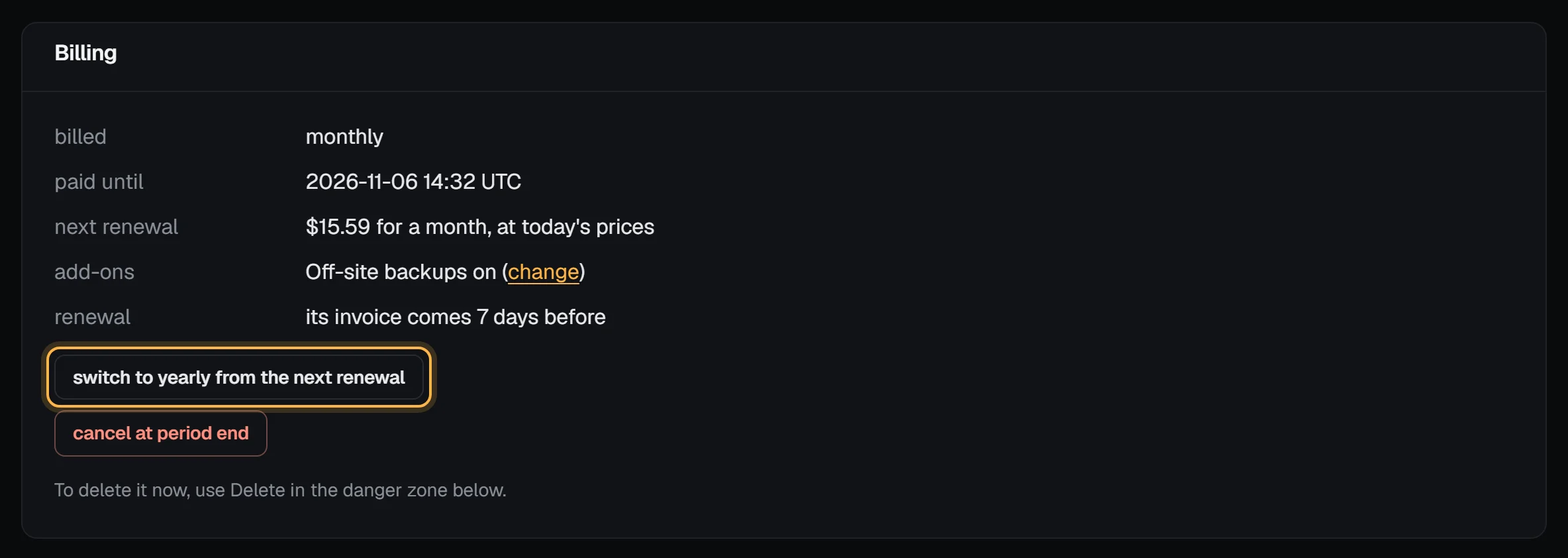 The Billing box of a server: billed monthly, paid until 2026-11-06, next renewal $15.59 for a month at today's prices, off-site backups on as an add-on, and the switch to yearly from the next renewal button outlined above cancel at period end